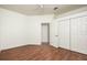 Spacious bedroom with laminate floors, double closets and ceiling fan at 566 Oak Bay Dr, Osprey, FL 34229