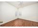 Bright bedroom with laminate wood floors and ceiling fan at 566 Oak Bay Dr, Osprey, FL 34229