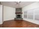 Stone fireplace in the living room at 566 Oak Bay Dr, Osprey, FL 34229