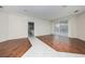 Spacious living room featuring hardwood floors and access to a patio at 566 Oak Bay Dr, Osprey, FL 34229