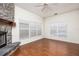 Bright living room with hardwood floors and large windows at 566 Oak Bay Dr, Osprey, FL 34229