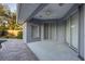 Covered patio adjacent to the pool at 566 Oak Bay Dr, Osprey, FL 34229