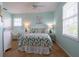 Charming bedroom with coastal decor and lots of natural light at 7007 Holmes Blvd, Holmes Beach, FL 34217