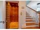Elegant home interior with a wood elevator and staircase at 7007 Holmes Blvd, Holmes Beach, FL 34217