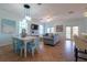 Open concept living and dining space with coastal decor at 7007 Holmes Blvd, Holmes Beach, FL 34217