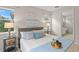 Spacious bedroom with ensuite bathroom access at 8792 Rain Song Rd, Sarasota, FL 34238