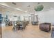 Elegant community room features comfortable seating and multiple tables at 8792 Rain Song Rd, Sarasota, FL 34238