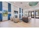 Community room with fireplace and comfortable seating at 8792 Rain Song Rd, Sarasota, FL 34238
