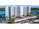 Stunning waterfront condo with covered parking, lush landscaping, and amenities at 9393 Midnight Pass Rd # 201, Sarasota, FL 34242