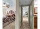 Inviting main bedroom with decorative ceiling fan and access to bathroom and another bedroom at 9393 Midnight Pass Rd # 201, Sarasota, FL 34242