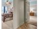 Inviting main bedroom with decorative ceiling fan and access to bathroom and another bedroom at 9393 Midnight Pass Rd # 201, Sarasota, FL 34242