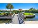 Waterfront pavilion with seating area and grill, perfect for outdoor gatherings at 9393 Midnight Pass Rd # 201, Sarasota, FL 34242