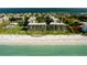 Aerial view of beachfront property and condo building at 1055 Gulf Of Mexico Dr # 504, Longboat Key, FL 34228