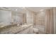Clean bathroom with granite countertop, shower/tub combo, and updated fixtures at 1055 Gulf Of Mexico Dr # 504, Longboat Key, FL 34228