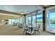 Bright community room with ocean view and seating at 1055 Gulf Of Mexico Dr # 504, Longboat Key, FL 34228
