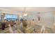 Open concept living and dining area with ocean view at 1055 Gulf Of Mexico Dr # 504, Longboat Key, FL 34228