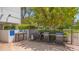 Community grilling area with multiple grills for resident use at 1055 Gulf Of Mexico Dr # 504, Longboat Key, FL 34228