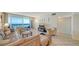 Spacious living room with ocean view and comfortable seating at 1055 Gulf Of Mexico Dr # 504, Longboat Key, FL 34228