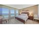 Main bedroom with king-size bed and breathtaking ocean view at 1055 Gulf Of Mexico Dr # 504, Longboat Key, FL 34228