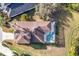 Top-down view of a home with pool and spa enclosed by a screen at 12342 Lavender Loop, Bradenton, FL 34212