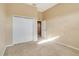 Unfurnished bedroom with wall-to-wall carpeting and a closet at 12342 Lavender Loop, Bradenton, FL 34212