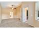 Spacious bedroom with ceiling fan and access to the bathroom and outdoor area at 12342 Lavender Loop, Bradenton, FL 34212