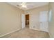 Empty bedroom with neutral-colored walls and carpeted flooring at 12342 Lavender Loop, Bradenton, FL 34212