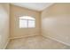 Vacant bedroom featuring carpeted flooring and a large window with blinds at 12342 Lavender Loop, Bradenton, FL 34212