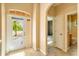 Welcoming foyer with tile flooring and views of a guest bedroom and bathroom at 12342 Lavender Loop, Bradenton, FL 34212