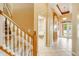 Foyer area features staircase, laundry area, and entryway at 12342 Lavender Loop, Bradenton, FL 34212