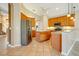 Kitchen with stainless steel appliances and wood cabinetry at 12342 Lavender Loop, Bradenton, FL 34212