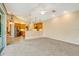 Open living room adjacent to a kitchen with vaulted ceilings at 12342 Lavender Loop, Bradenton, FL 34212