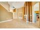 Living room with fireplace, tile floors, and high ceilings at 12342 Lavender Loop, Bradenton, FL 34212