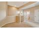 Carpeted loft area with a half wall and access to additional rooms at 12342 Lavender Loop, Bradenton, FL 34212