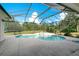 Spacious screened-in pool and spa surrounded by a large paved patio at 12342 Lavender Loop, Bradenton, FL 34212