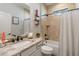 Stylish bathroom with a bathtub, tiled shower walls, and a modern vanity at 1256 Napoleon Rd, North Port, FL 34288