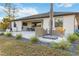 Backyard with patio, pool, and landscaping at 1256 Napoleon Rd, North Port, FL 34288