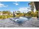 Inviting pool with lounge chairs and paver patio at 1256 Napoleon Rd, North Port, FL 34288