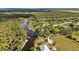 Aerial view of riverfront property and neighborhood at 1285 & 1289 Hagle Park Rd, Bradenton, FL 34212