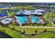 Community pool with waterslide, lap lanes, and clubhouse at 15511 Islandwalk Ave, Bradenton, FL 34211