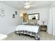 Cozy bedroom with a comfortable bed and eclectic decor at 1700 Cove Ii Pl # 311, Sarasota, FL 34242