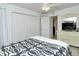 Bright bedroom with double bed and large closet at 1700 Cove Ii Pl # 311, Sarasota, FL 34242