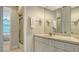 Small bathroom with single vanity and shower/tub combo at 1901 Harbour Links Cir # 1, Longboat Key, FL 34228