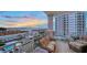 Relaxing balcony with comfortable seating and stunning views of the ocean and coastline at 2050 Benjamin Franklin Dr # B603, Sarasota, FL 34236