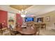 Dining area adjacent to the living room and kitchen with a peek-a-boo view at 2050 Benjamin Franklin Dr # B603, Sarasota, FL 34236