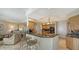 Kitchen with granite countertops, stainless steel appliances, and bar seating at 2050 Benjamin Franklin Dr # B603, Sarasota, FL 34236