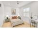 Cozy bedroom with a queen bed, nightstands, and plenty of light at 2112 Calusa Lakes Blvd, Nokomis, FL 34275