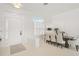 Bright dining area with white walls and modern furnishings at 2112 Calusa Lakes Blvd, Nokomis, FL 34275