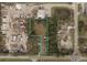 Aerial view of a commercial lot bordered by trees at 3219 63Rd E Ave, Bradenton, FL 34203