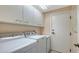 Convenient laundry room with washer and dryer included at 385 N Point Rd # 404, Osprey, FL 34229